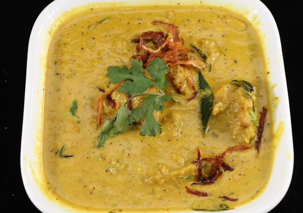 Chicken Kurma · Chicken cooked in a coconut and cashew gravy. Enjoyed best with a kerala parotta (in the bread section).