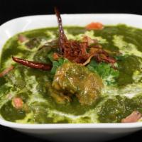 Chicken Saag · Chicken cooked in a leafy based sauce, saag (spinach) in this case with a touch of cream.