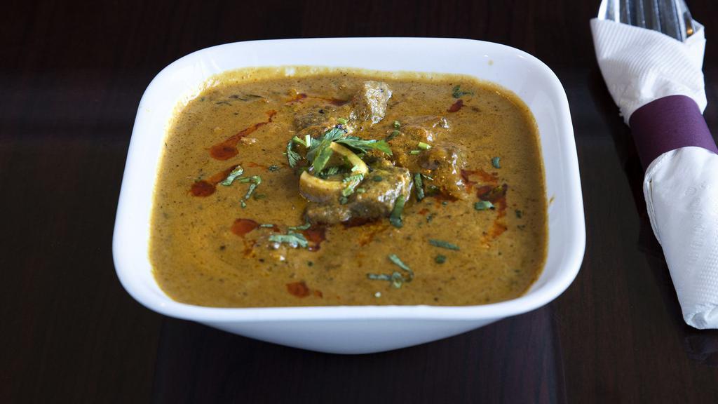 Dum Ka Goat · Goat gently simmered over a slow fire and cooked in a hyderabadi influenced gravy.