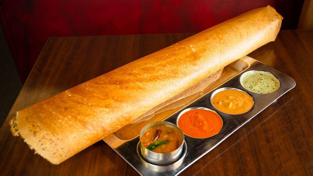 Mysore Masala Dosai · Same as the plain but brushed with mysore masala and masala topping.
