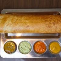 Plain Dosa · Crepe made with lentil and rice flour, served with chutney and lentil soup.