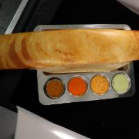 Paper Roast · Crispy crunchy Crepe made with lentil and rice flour, served with chutney and lentil soup.