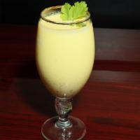Mango Lassi · Alphonso mango pulp blended with yogurt and served with a straw for the brave.