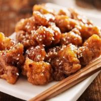 Sesame Chicken · Perfect aged chicken, carefully sliced, cooked with chef's sauce, served with sesame seeds.