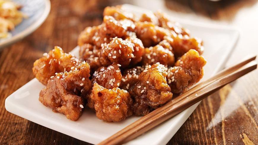 Sesame Chicken · A chunk of chicken breaded and deep fried in sweet sesame sauce.