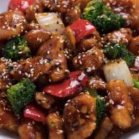 Sesame Chicken · Served with fried rice steamed or lo mein and egg roll.