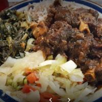 Oxtail Combo · Combo comes with a choice of curry chicken, jerk chicken or stew chicken.