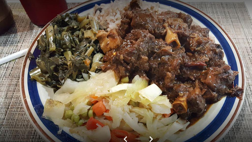 Oxtail Combo · Combo comes with a choice of curry chicken, jerk chicken or stew chicken.