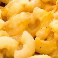 Baked Mac 'N Cheese · Macaroni noodles +three types of cheeses, baked to golden perfection 
*contains egg
