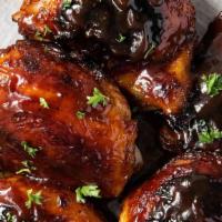 Bbq Chicken · marinated and broiled in smoky BBQ sauce