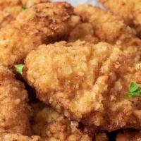 Fried Chicken Tenders · 4 Fresh chicken tenders, hand dipped and fried to golden perfection 
*Tenders are not pre-br...