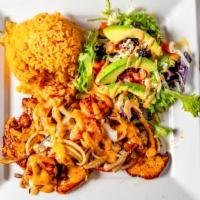 Chicken Vallarta · Grilled chicken and shrimp cooked with onions, mushrooms, and chipotle sauce. Served with tw...