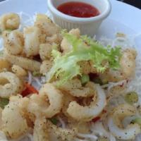 Crispy Thai Calamari · Fresh calamari, tempura crusted and served with our sweet Thai chili sauce.