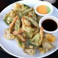 Vegetable Tempura · A healthy portion of mixed vegetables served with duo of Bang-Bang and wasabi sauce.