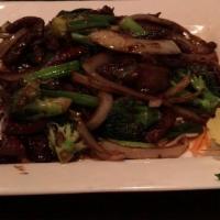 Spicy Mongolian Beef Or Chicken · Wok fried sliced beef or chicken served with scallions, onion, broccoli and chili served ove...