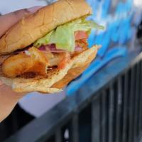 Cod Fish Sandwich · Beer battered cod filet with lettuce, tomato, pickles, onion