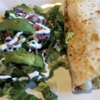 Quesadilla Del Puerto · A grilled flour tortilla filled with cheese, shrimp and scallops. Served with romaine lettuc...