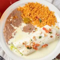 Don Juan Special Burrito. · Burrito filled with chunks of tender chicken breast and spinach, topped cheese dip and pico ...