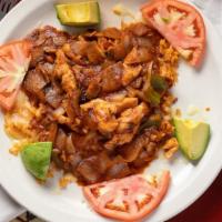 Arroz Con Pollo · Tender sliced chicken breast specially prepared with fresh mushrooms, onion and bell peppers...