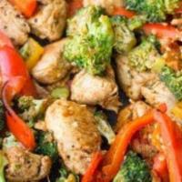 Mexican Stir Fry · Chicken breast strips sautéed with mushrooms, onions, carrots, broccoli, green peppers, gree...