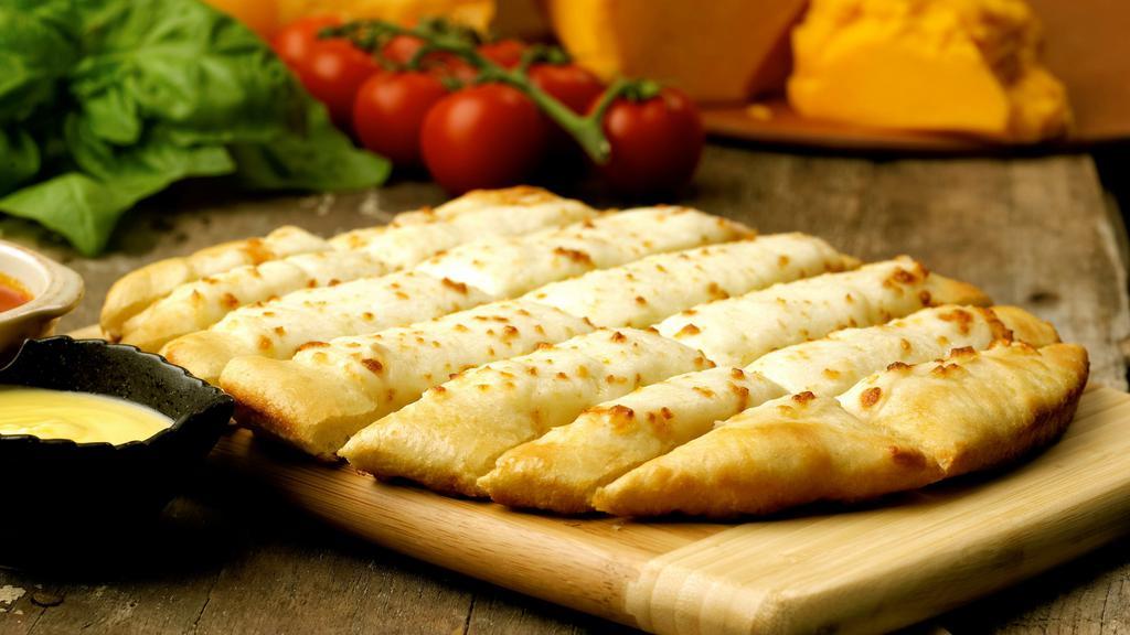 Breadsticks · Our homemade, thick dough smothered with Mozzarella cheese. Served with garlic butter and marinara sauce.