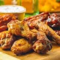 Chicken Wings · Tender, juicy wings served flaming hot or smoky barbeque with your choice of creamy ranch or...