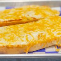 Craft House Garlic Bread · Layered & baked with provolone & cheddar cheese.