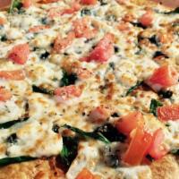 Margherita Crisp · Sun-dried tomato tortilla brushed with olive oil & covered in garlic, basil, spinach, 100% m...