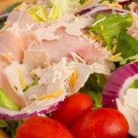 Chef Salad · Iceberg, romaine & spinach,  chopped ham & turkey, eggs, cheddar cheese, red onions & grape ...
