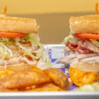 Turkey · Sliced turkey, provolone cheese, lettuce & tomato. Served with mayo.
