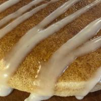 Cinna Sticks · Cinnamon sugar mix topped with a sweet home-style icing