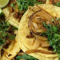 Tacos · Corn tortilla filled with your choice of meat, chopped onion and cilantro.