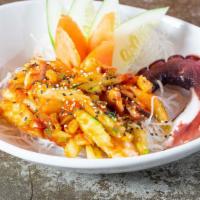 Spicy Octopus · Spicy. Diced octopus and cucumber in spicy sauce, scallions, sesame seeds, ponzu sauce, and ...