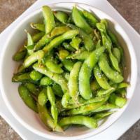 Edamame · Steaming hot soybeans and lightly salted.