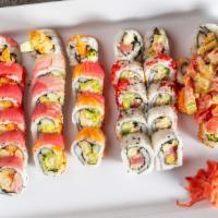 Yummy · Rainbow of fish tuna, salmon, red snapper on top of a shrimp tempura roll.