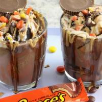 Reese'S Hot Cocoa · This thick hot chocolate is infused with Reese's peanut syrup, steamed milk and topped with ...