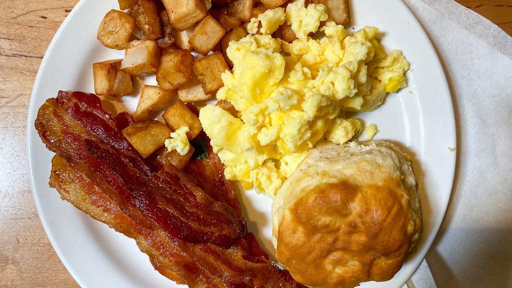 All-Star Breakfast (750 Cal) · Two freshly-cracked eggs over easy with crispy bacon, breakfast potatoes and a buttermilk biscuit.