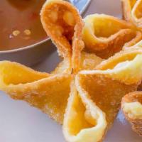 Crab Cheese Wonton · Five pieces crispy fried wontons filled with cream cheese and crabmeat.