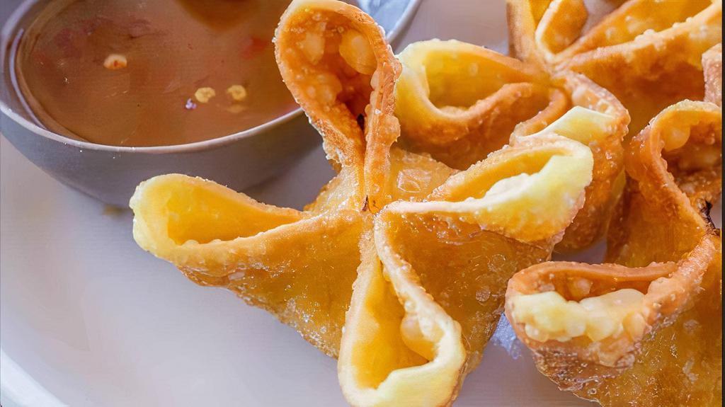Crab Cheese Wonton · Five pieces crispy fried wontons filled with cream cheese and crabmeat.