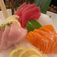 Tri-Color Sashimi · Tuna, salmon and yellowtail. Four pieces each.