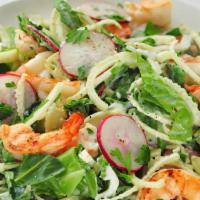 Grilled Asian Shrimp Salad · Grilled shrimp, fresh garden greens, dried fruit, and almond chips with house dressing.