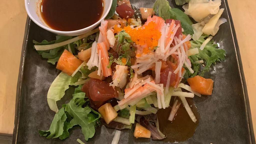 Seafood Salad · Octopus, fresh fish, shrimp, crab stick, masago, avocado, and cucumber mixed with spicy ponzu sauce. Rare.