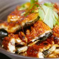Bbq Eel Rice Bowl · Thin sliced BBQ eel top on sushi rice with the veggie and eel sauce.
