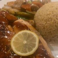 Hibachi Salmon · Served with soup and salad, grilled vegetables, and fried rice.