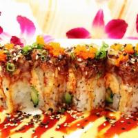Filet Mignon Roll · Tender filet marinated with our special recipe sauce and served atop a snow crab roll. Toppe...