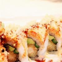 Rocking Roll · Fried shrimp tempura, avocado, and asparagus. Topped with snow crab, tempura batter, and eel...