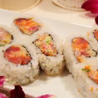 Fire Cracker Roll · Tuna, fresh salmon, and yellowtail mixed together with green onion, wasabi, and tempura batt...