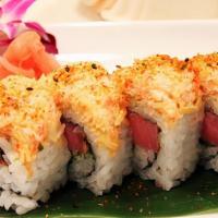 Ridgeland Roll · Peppered seared tuna, avocado, and green onion inside with wasabi roe outside and snow crab ...