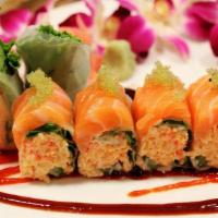 Phoenix Roll · Snow crab, asparagus, and spicy mayo wrapped in Rice paper and topped with fresh salmon and ...