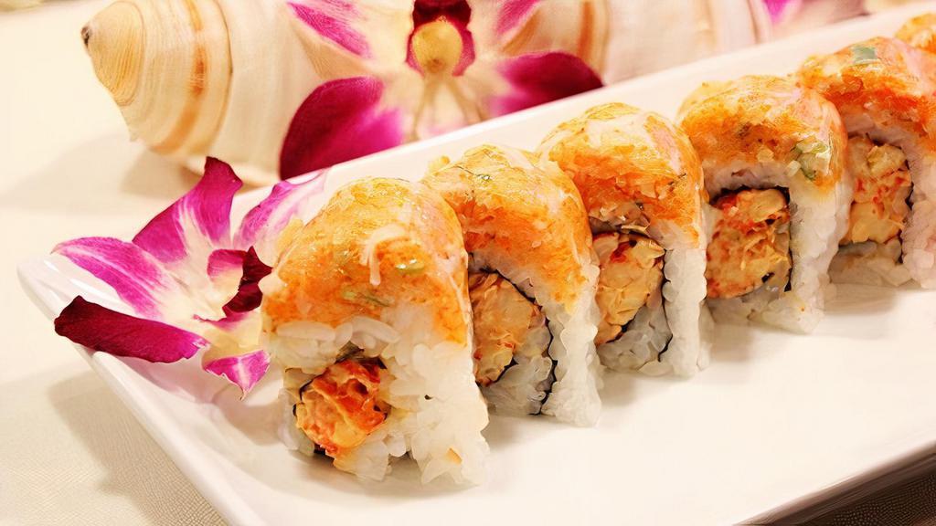 Lion Roll · Spicy crawfish inside with crab stick, smelt roe, green onions, tempura batter, and mayo mixed together on top.